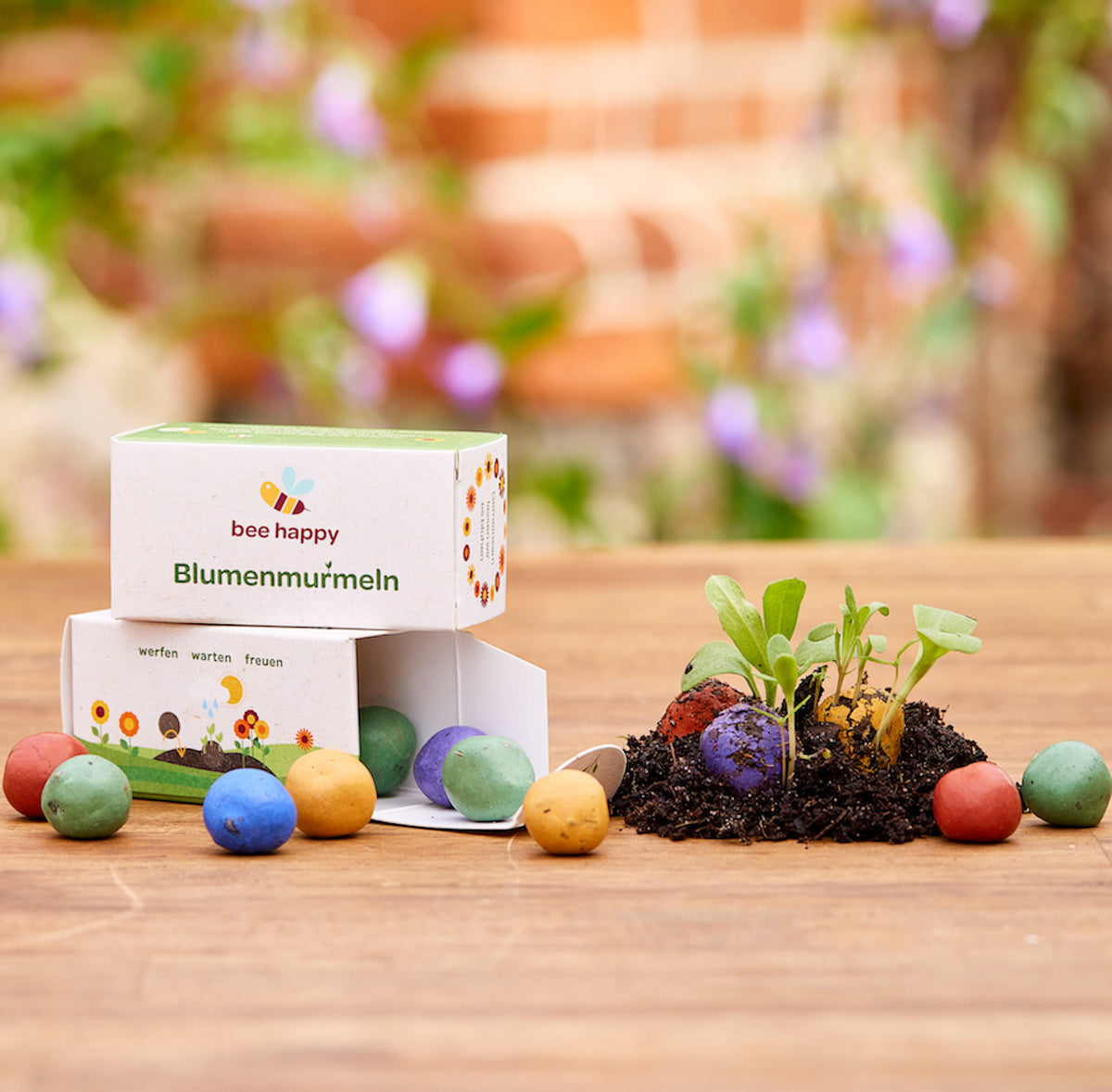12 flower marbles in a folding box