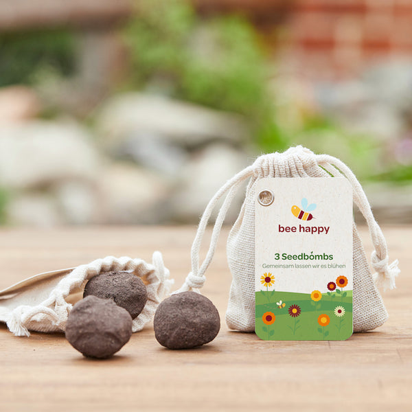 3 seed bombs in a cotton bag with individual hangtag