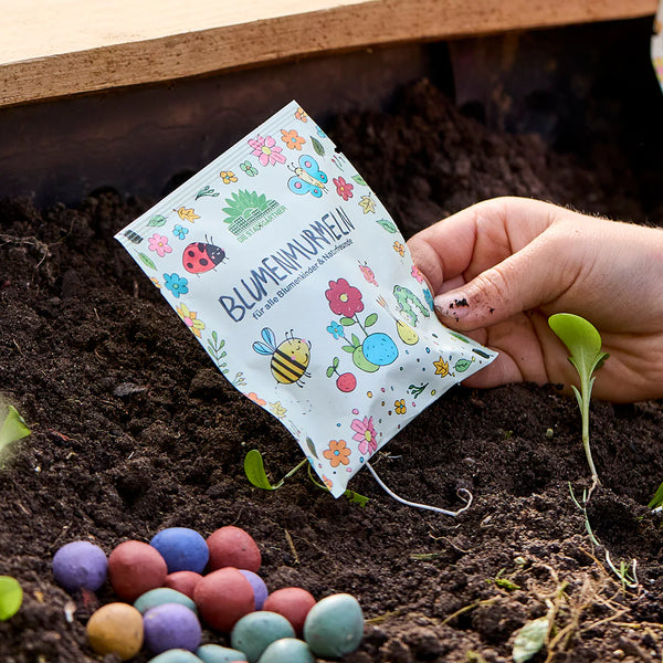 5 flower marbles in a sealed bag